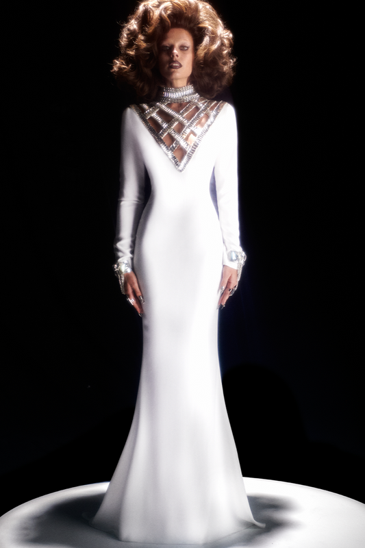 WHITE LONG-SLEEVED GOWN WITH EMBELLISHED STATEMENT